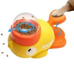 yorkie feeding duck toy